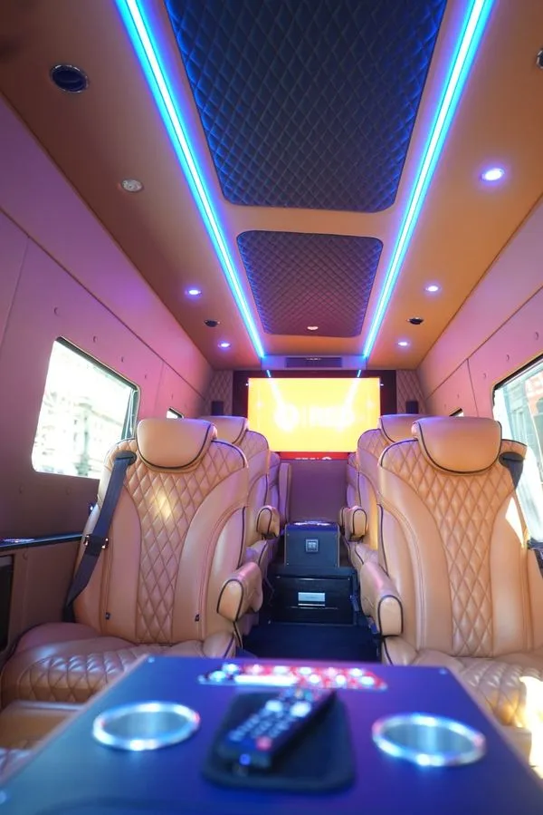The full length of an R5 Sprinter cabin, with paired captain seats either side of the aisle